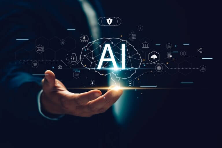 Un ejecutivo sostiene una proyección digital con la palabra “AI” en el centro, representando la responsabilidad tecnológica y la ética en la innovación empresarial.