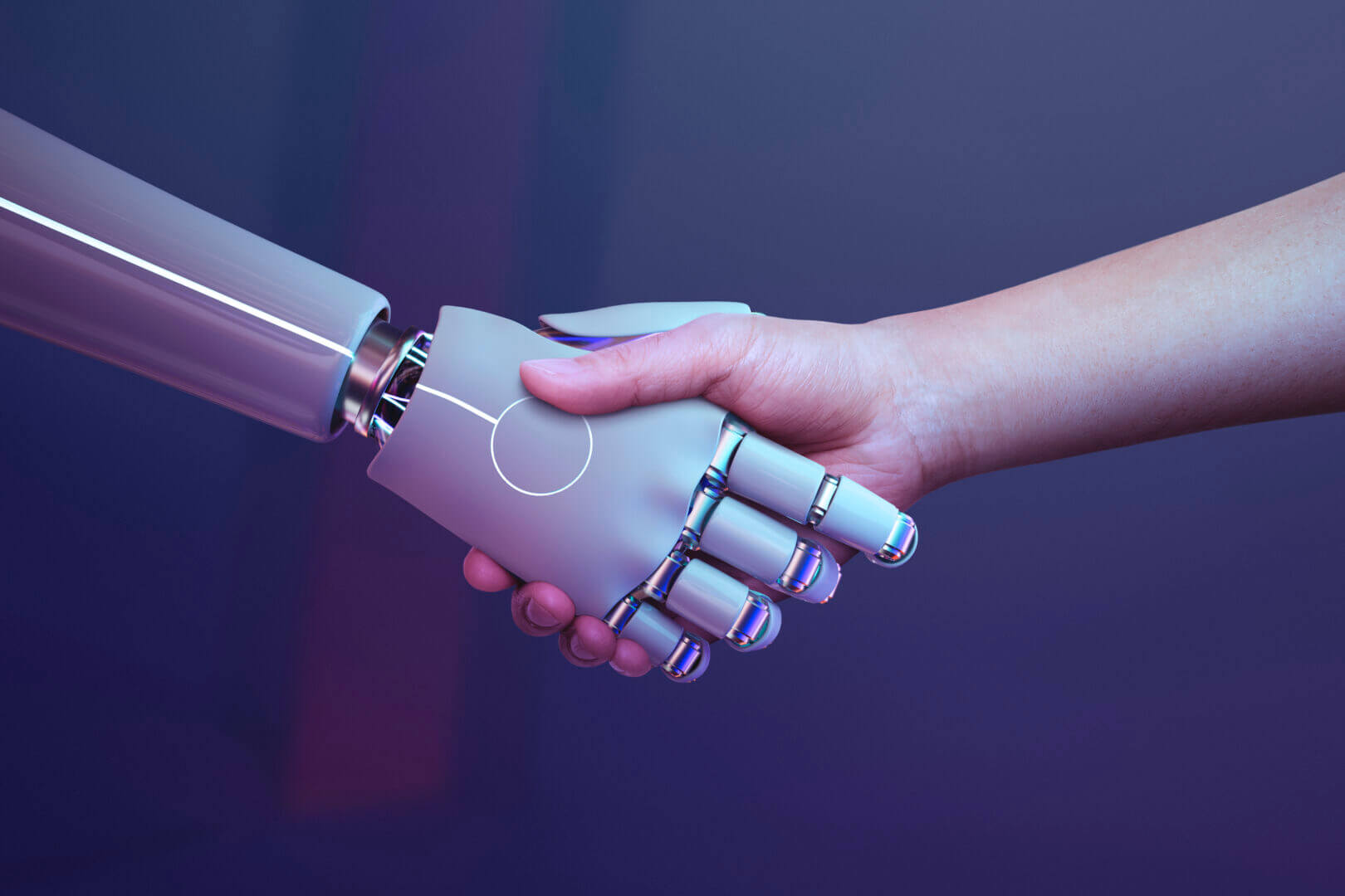 Un robot y una persona se dan la mano, representando la colaboración entre tecnología e inteligencia humana. El concepto de 'leyes IA' busca regular la inteligencia artificial para garantizar su uso ético y responsable en la sociedad.