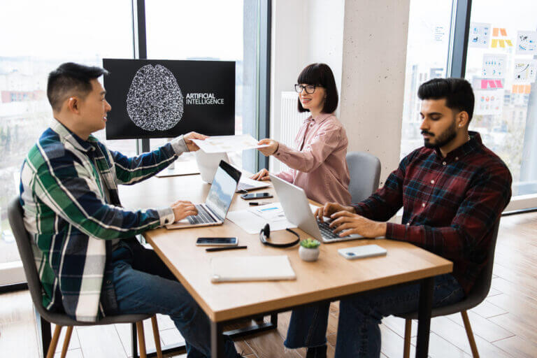 Team working on artificial intelligence project in office
